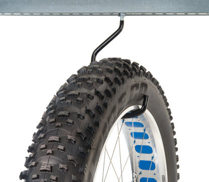Park Tool 470XX monté et tenant une roue de fatbike