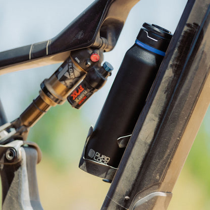 Bouteille Support MAG QUADLOCK — bouteille présentée sur un vélo